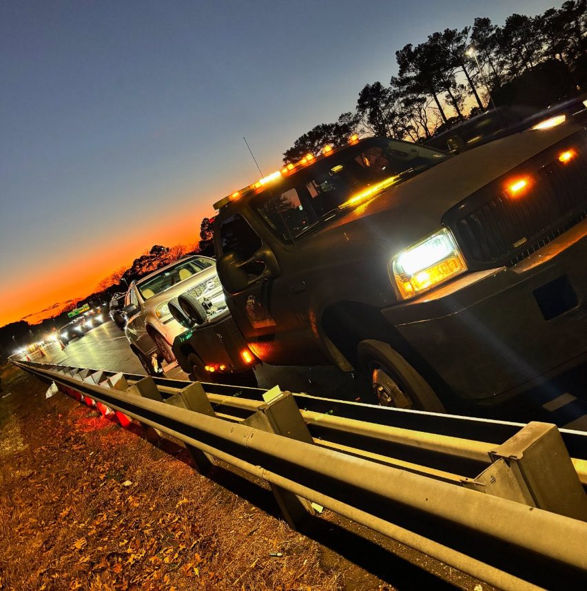 Rioliable Towing roadside tow at sunset in Hampton Roads